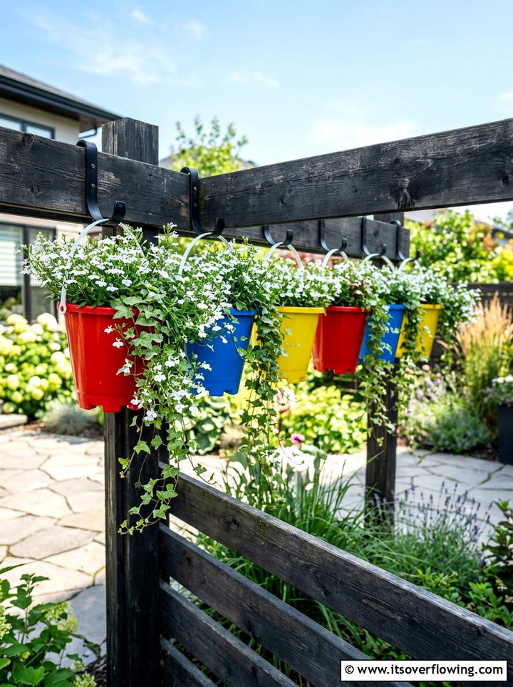 Beach bucket hanging planter - 25 recycled garden ideas with old toys