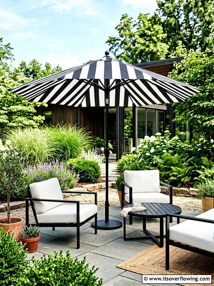 Black And White Striped Umbrella - 25 backyard ideas with umbrellas