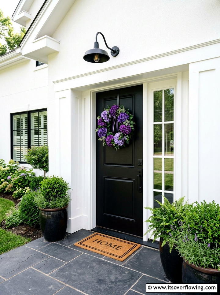 Black Door Contrast Look - 25 front porch decor ideas with hydrangea wreath