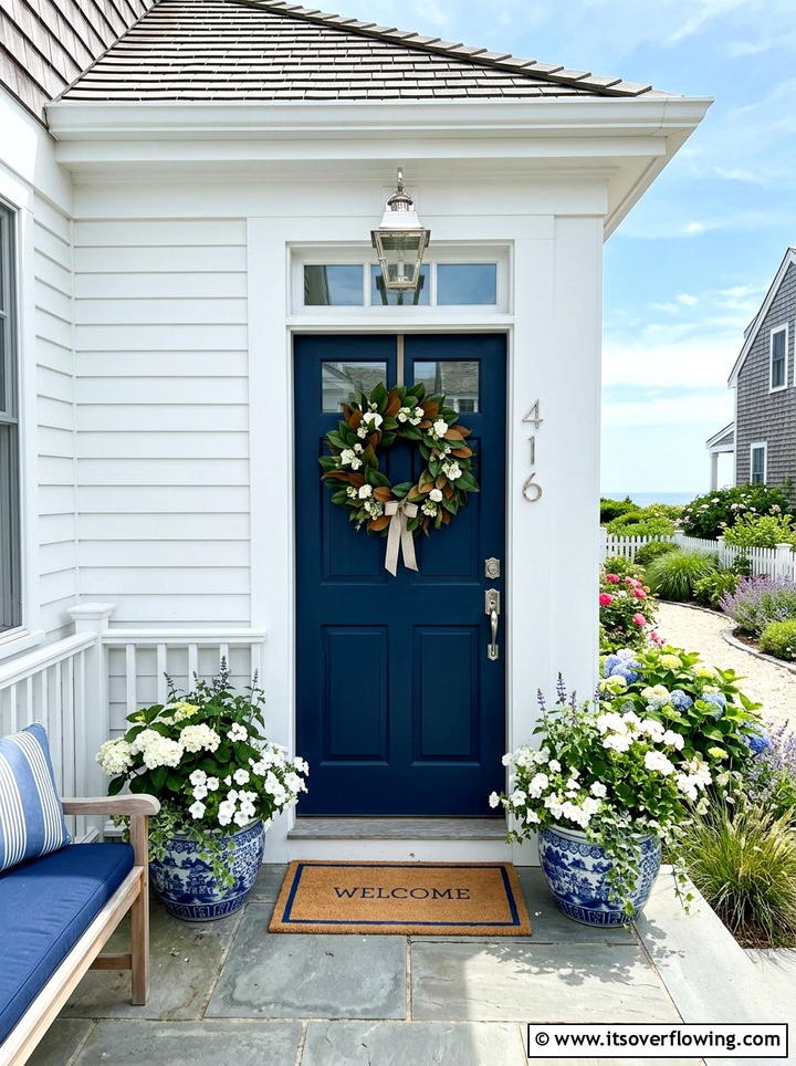 Blue Front Door - 25 front porch decor ideas with magnolia wreath