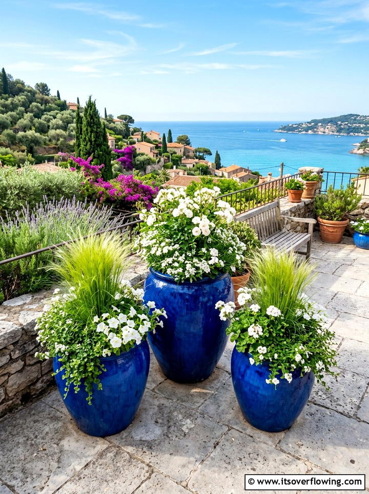 Blue Glazed Ceramic Planters - 25 garden design ideas with bold contrast