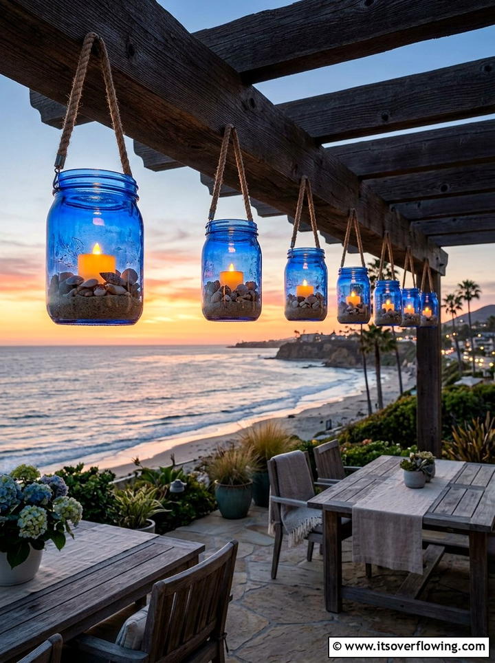 Blue Mason Jar Lanterns - 25 upcycled garden ideas with coastal style