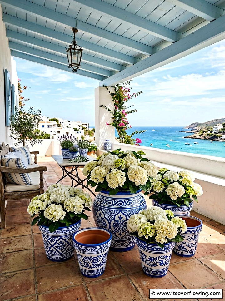 Blue and white terracotta pots - 25 front porch ideas with terracotta pots