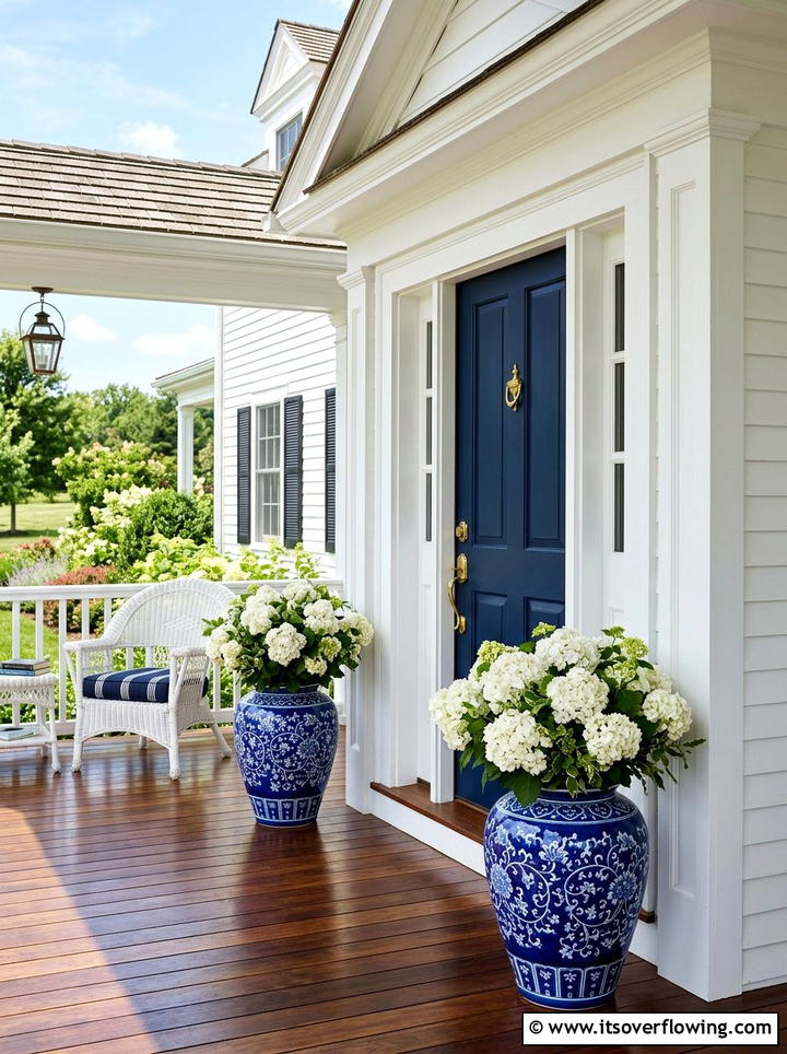Blue ceramic urns - 25 front porch ideas with tall planters