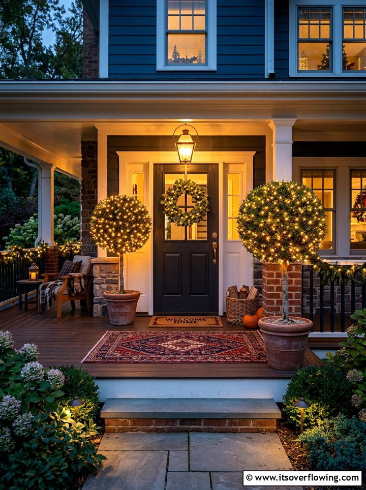 Boxwood topiary with fairy lights - 25 front porch decor ideas with topiaries