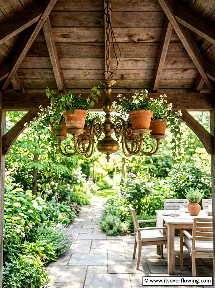 Chandelier plant hanger - 25 cheap garden ideas with thrifted decor