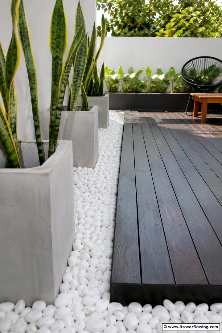 Chic Pebble Installation - 30 Stone Garden Ideas for Natural Outdoor Landscaping Designs