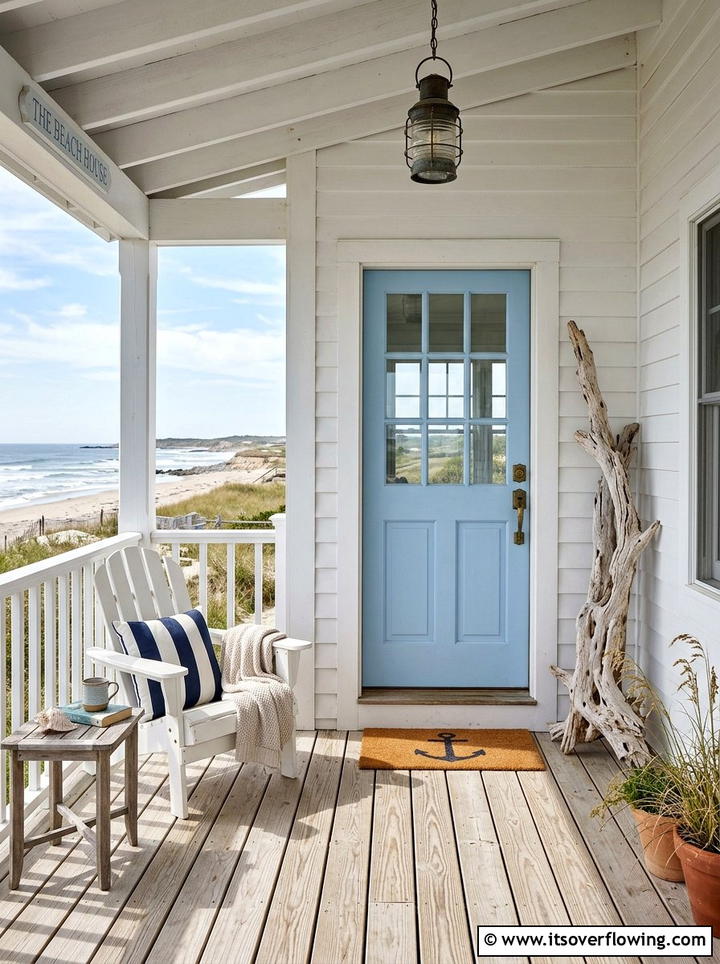 Coastal Blue Door With Driftwood Accents - 25 front porch decor ideas with asymmetrical layout
