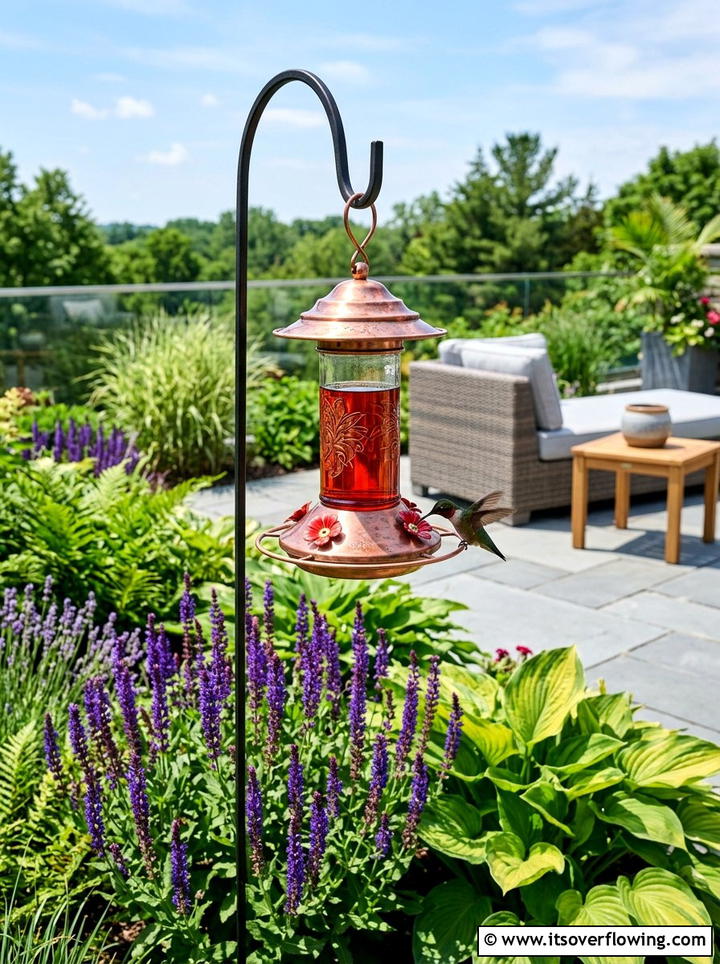 Copper hummingbird feeder - 25 garden decor ideas with feeders
