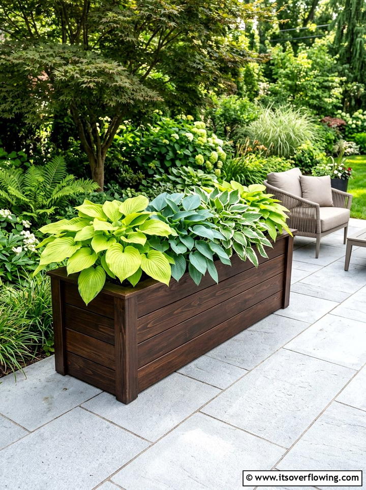 Dark Stained Modern Planter - 25 garden decor ideas with wooden planters