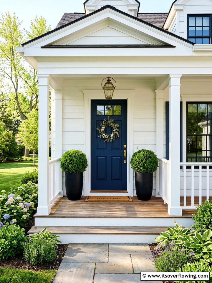 Double boxwood topiaries front door - 25 front porch decor ideas with topiaries