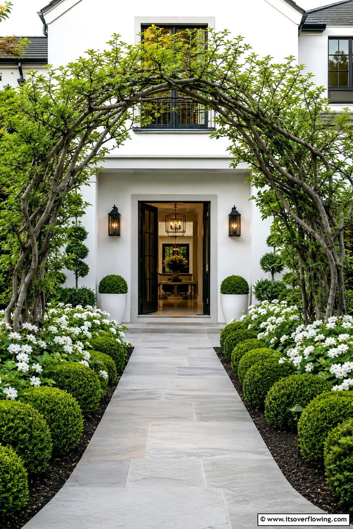 Elegant Arbor Entrance - 30 Tree Landscaping Ideas for Shade, Privacy, and Curb Appeal