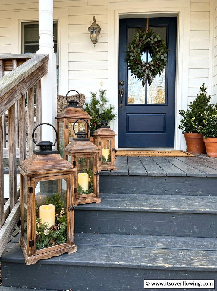 Elegant Lantern Lit Entrance - 25 front porch ideas with christmas decor
