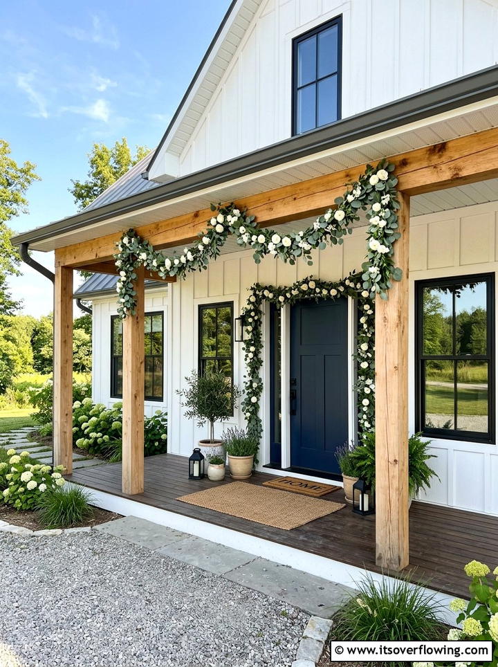 Eucalyptus and white flower garland for porch - 25 front porch ideas with floral garland