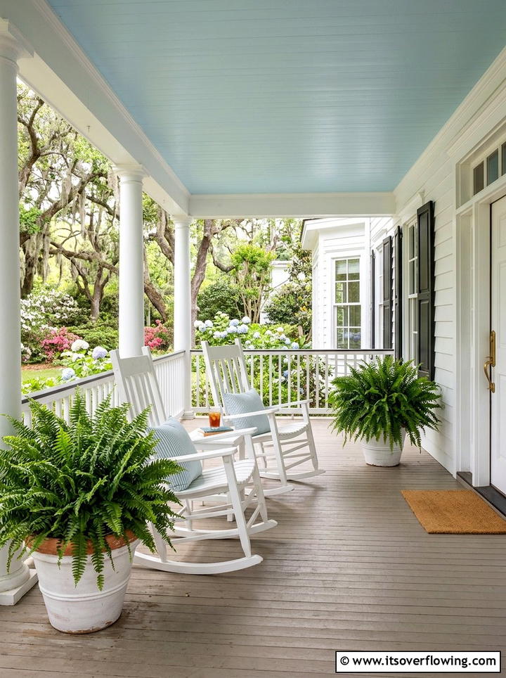 Ferns In White Wooden Rockers Setting - 25 front porch ideas with low maintenance plants