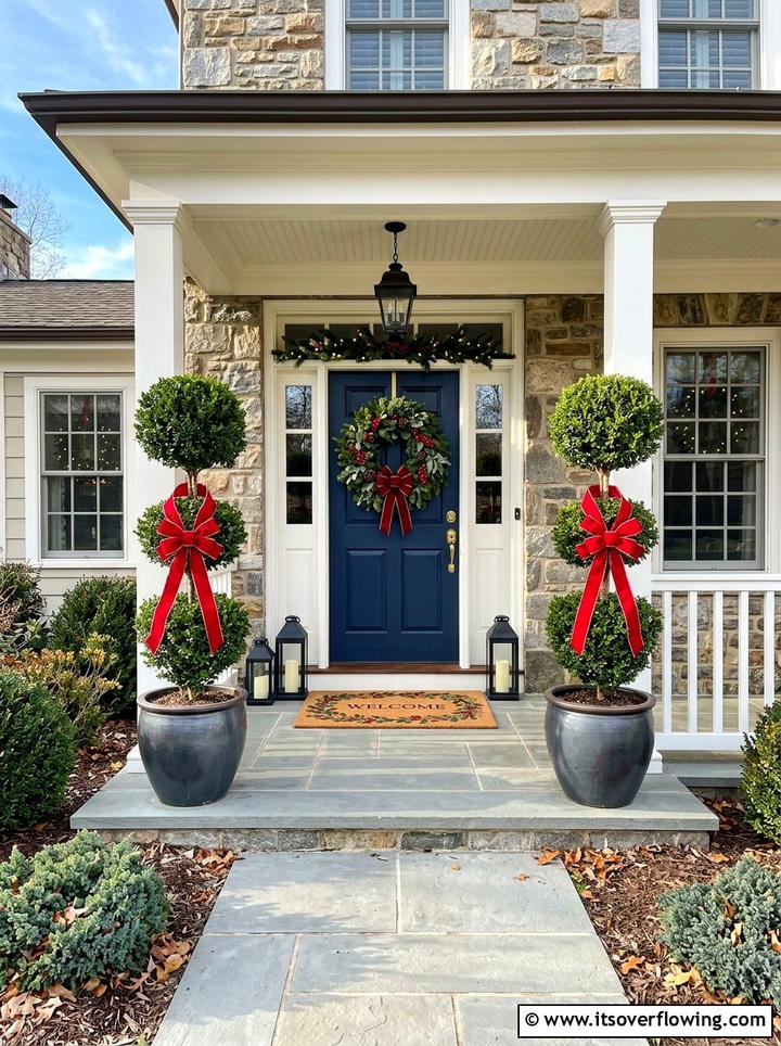 Front door topiaries with seasonal ribbons - 25 front porch decor ideas with topiaries
