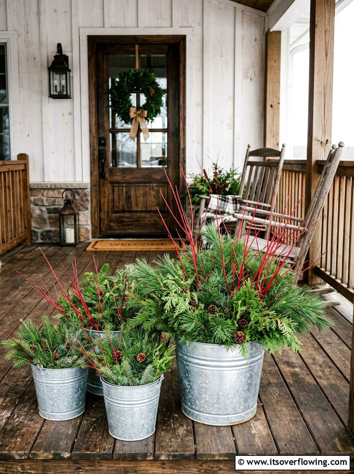 Galvanized Bucket Greenery - 25 front porch decor ideas for christmas