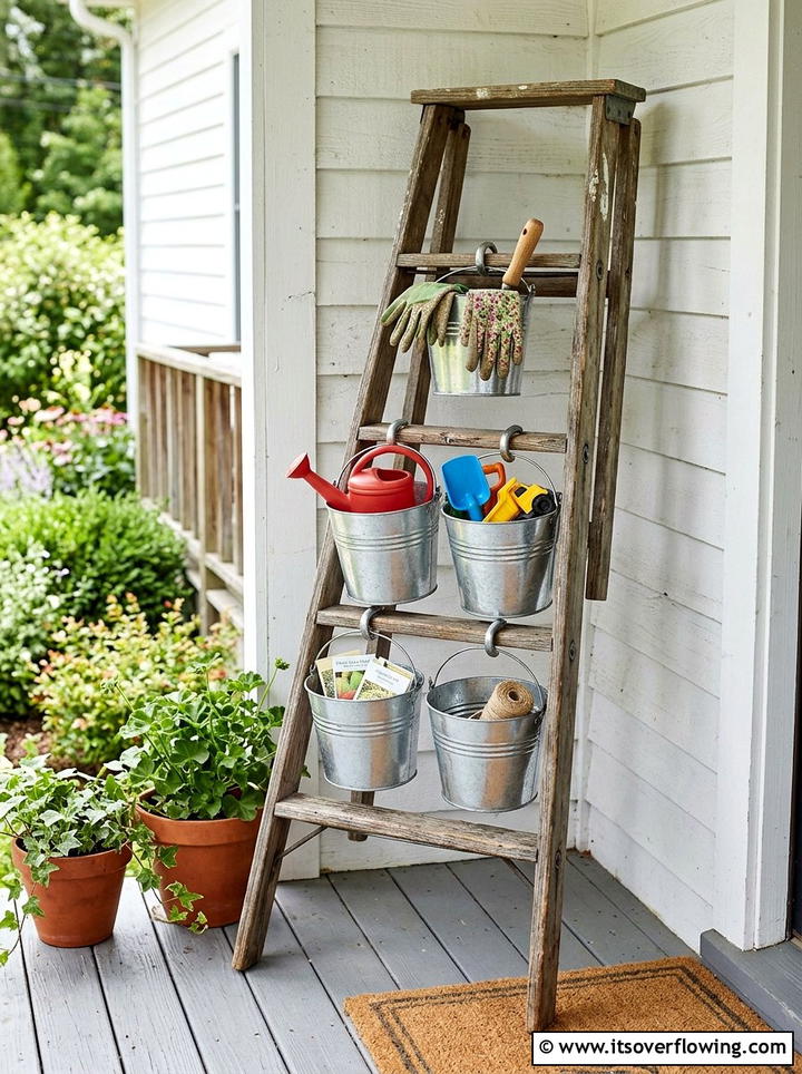 Galvanized Bucket Ladder Organizer - 25 front porch ideas with repurposed ladders