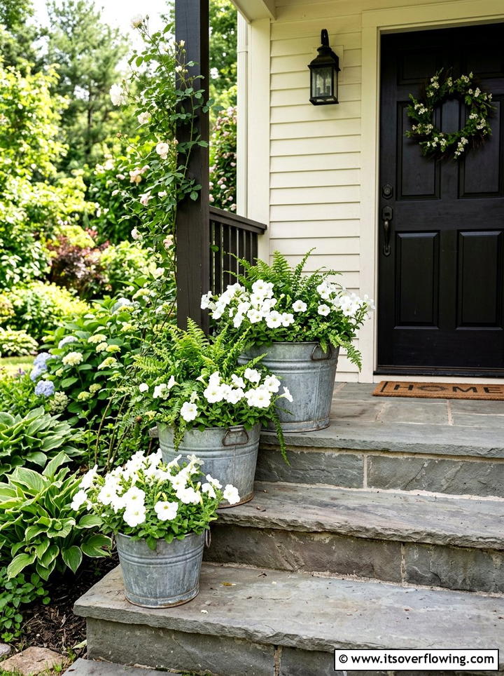 Galvanized Metal Planter - 25 front porch decor ideas with rustic accents