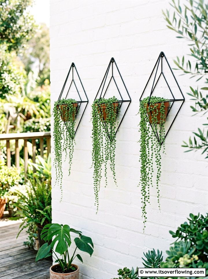 Geometric Black Wire Plant Hangers - 25 garden decor ideas with hanging baskets