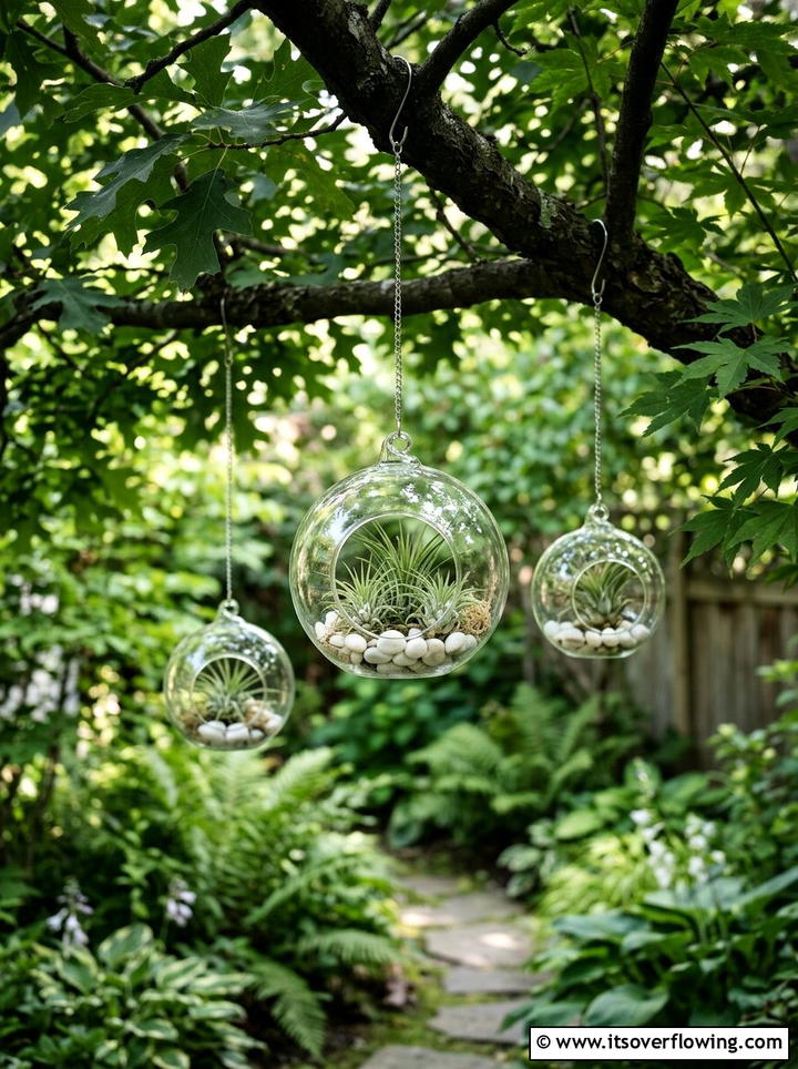 Glass Terrarium Hanging Orb - 25 garden ideas with hanging planters
