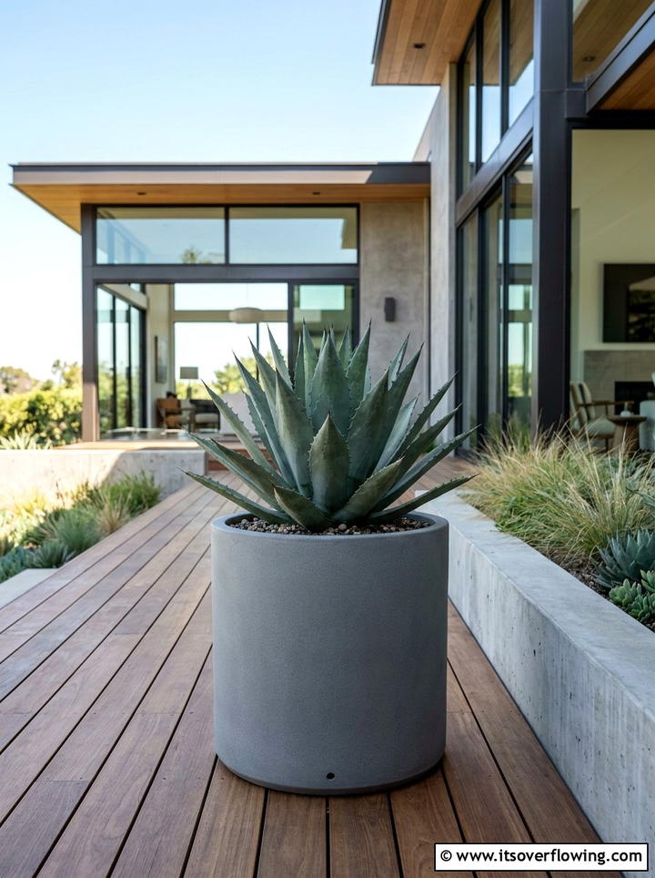 Gray Minimalist Ceramic Planter - 25 garden decor ideas with ceramic planters