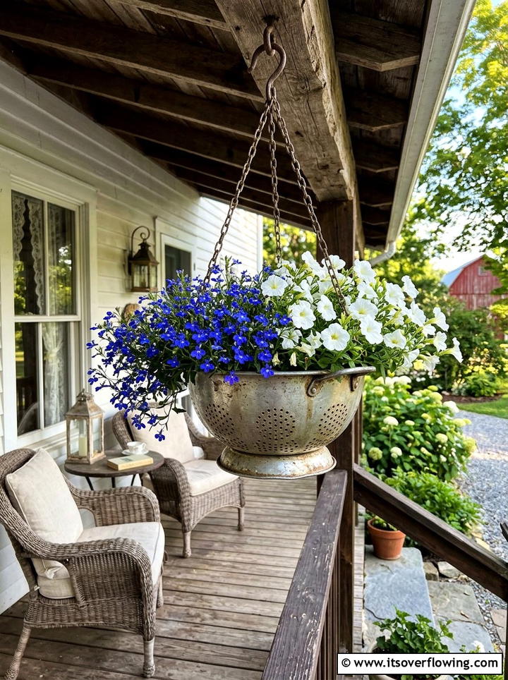 Hanging colander planter - 25 recycled garden ideas with old colanders