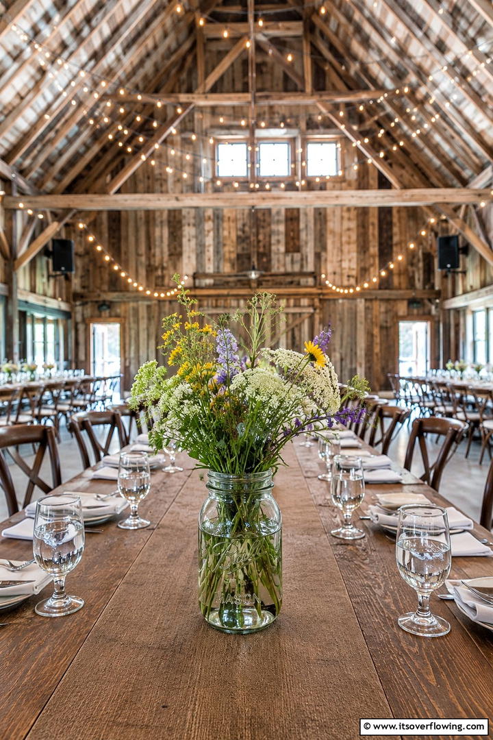Industrial Metal Bucket Arrangement - 30 Rustic Wedding Centerpieces for a Charming Celebration