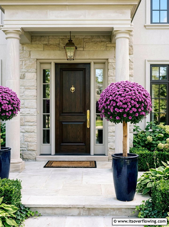 Large mum topiary by door - 25 front porch ideas with mums