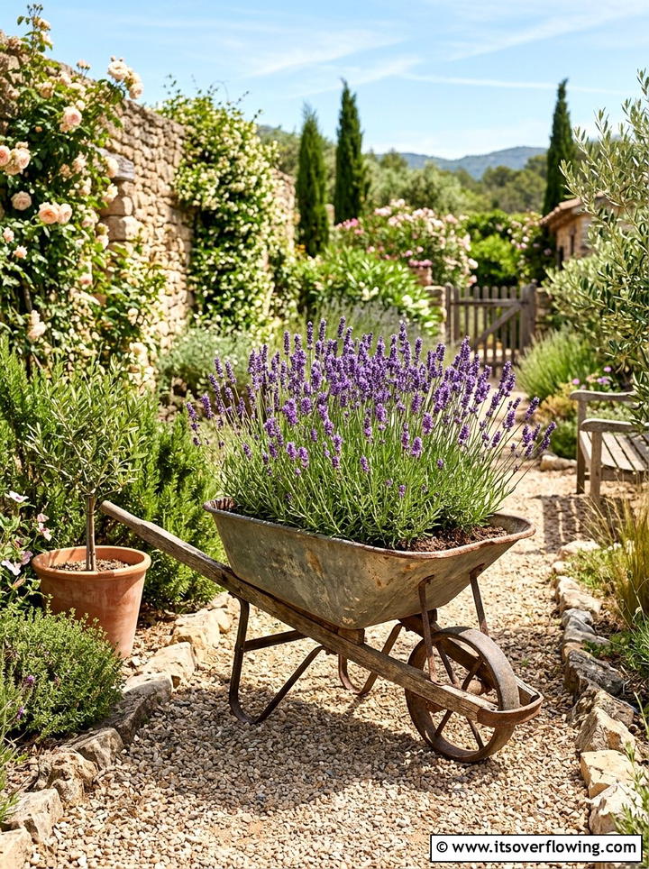 Lavender wheelbarrow planter - 25 upcycled garden ideas with old wheelbarrows