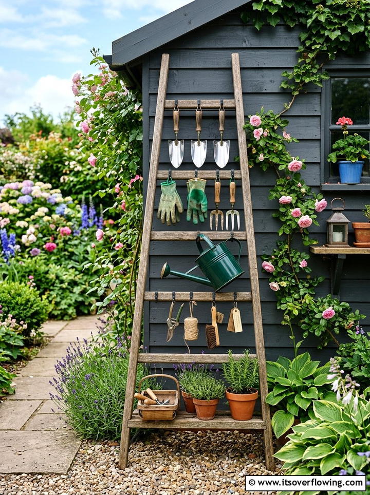 Leaning Ladder Tool Organizer - 25 garden ideas with old ladders