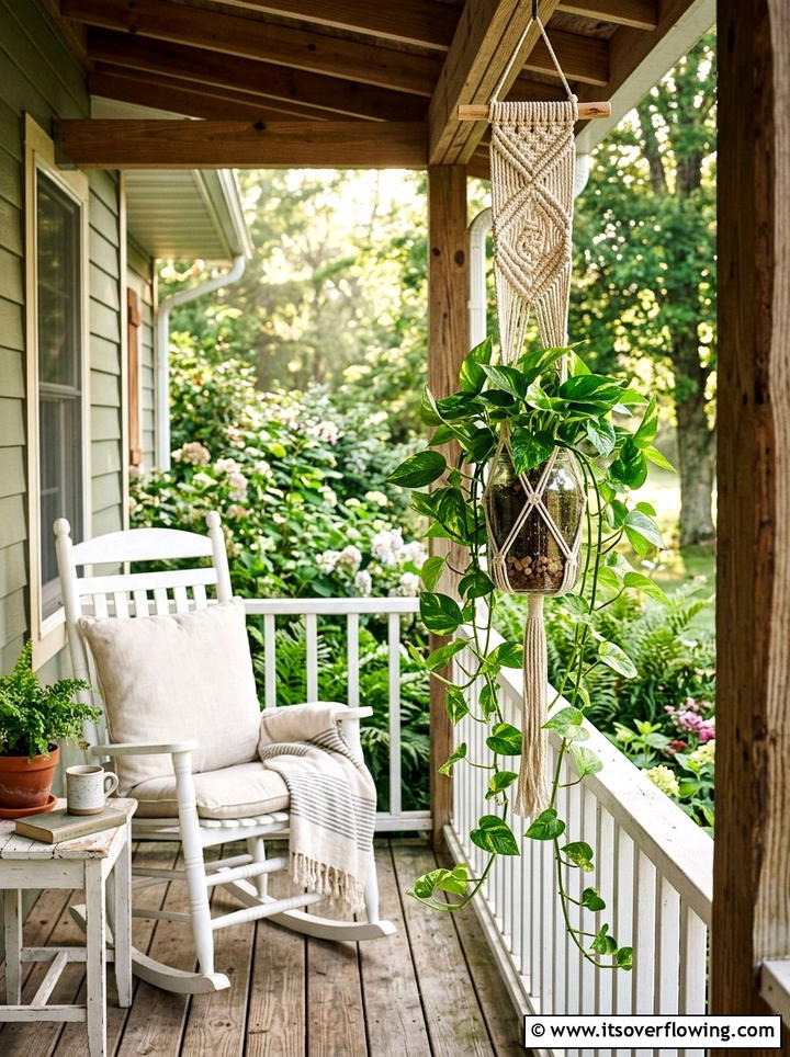 Macrame bottle planter on porch - 25 creative garden ideas with hanging bottle planters