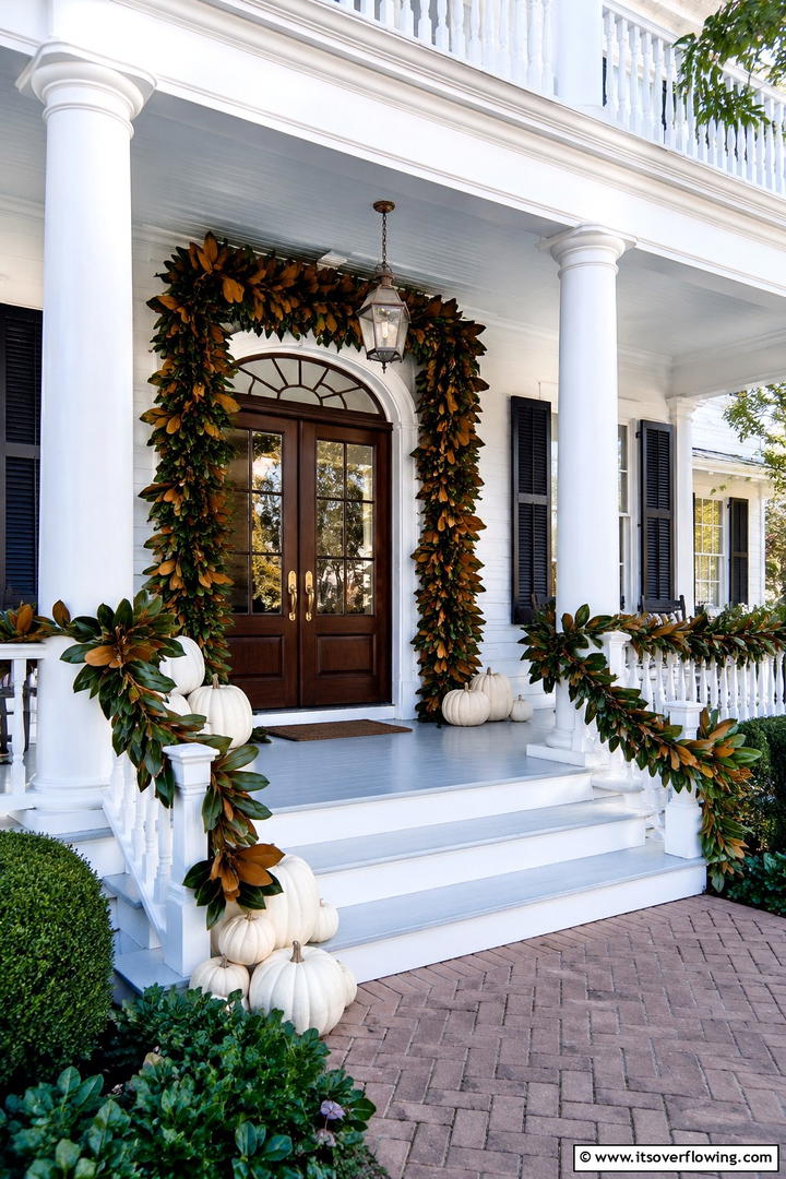 Magnolia Leaf Garland Display - 50 Modern Fall Porch Decor Ideas Roundup- Warm Welcomes