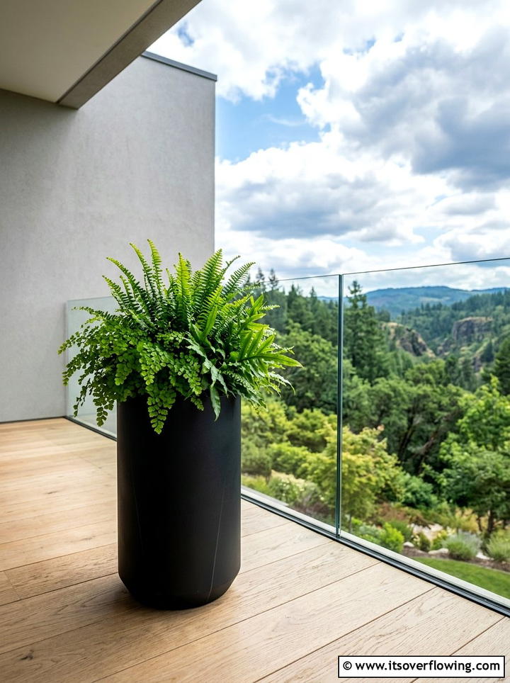 Matte black modern pot - 25 front porch ideas with painted pots
