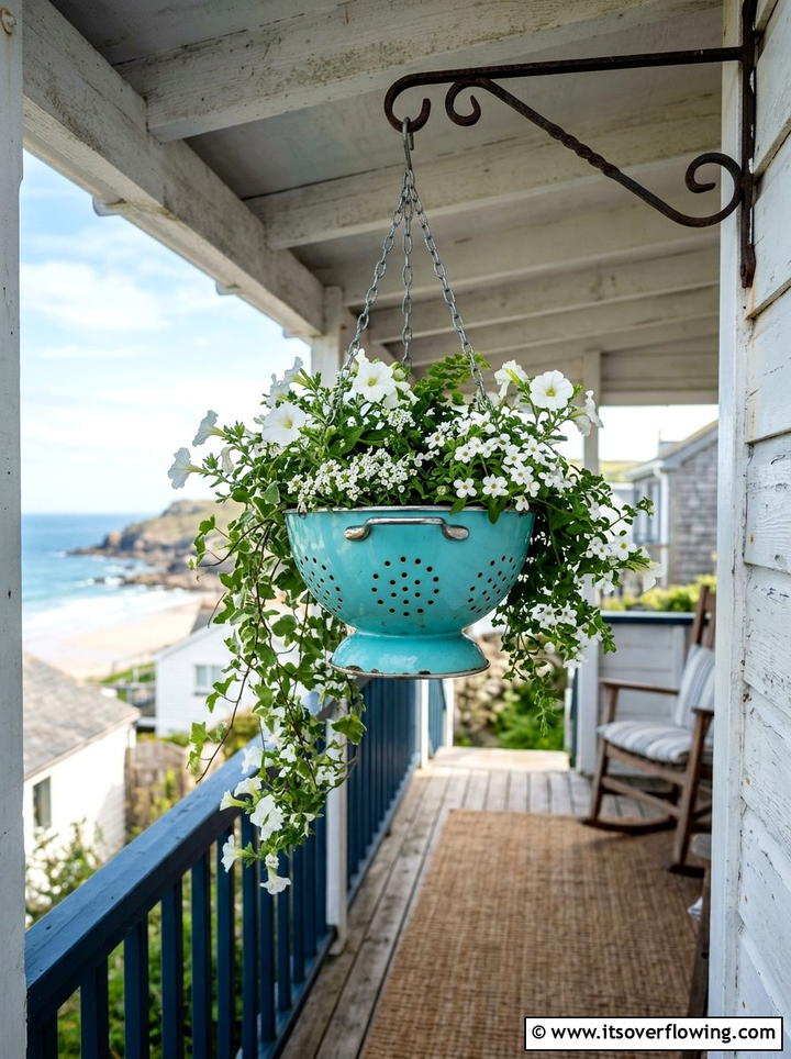Metal Colander Hanging Basket - 25 upcycled garden ideas with coastal style