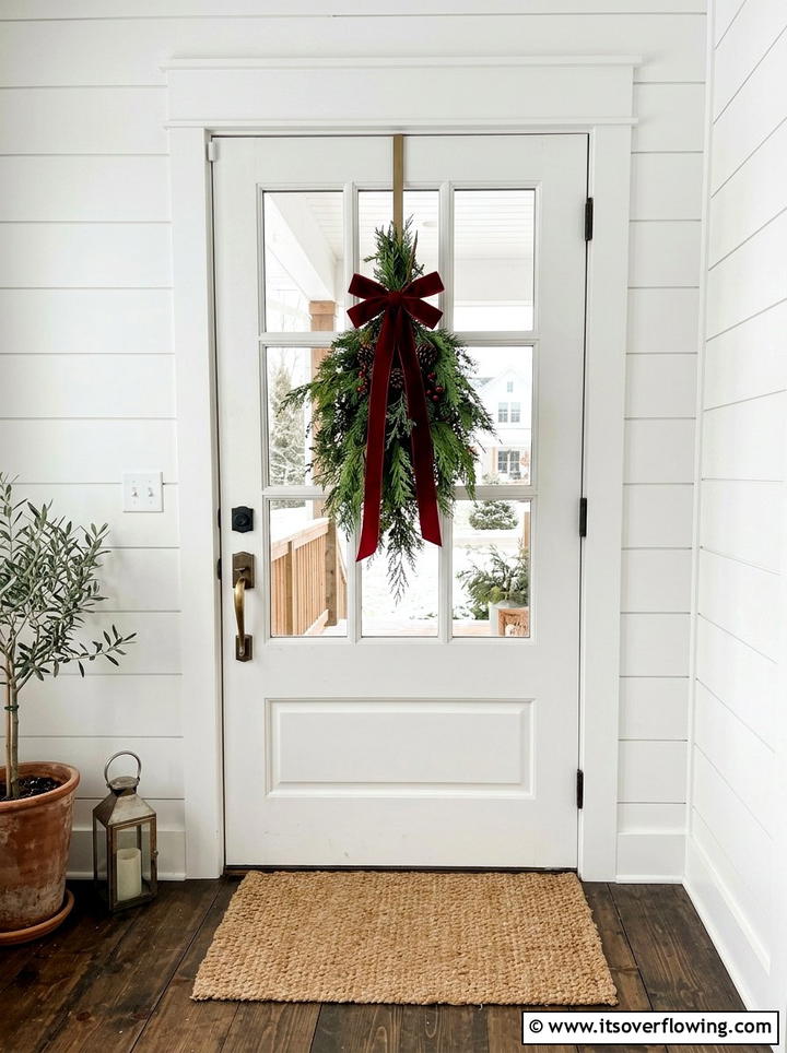 Minimalist Cedar Branch Swag - 25 front porch ideas with christmas decor