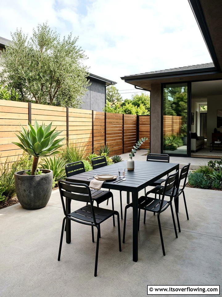 Minimalist Concrete Patio Dining - 25 backyard ideas with dining area
