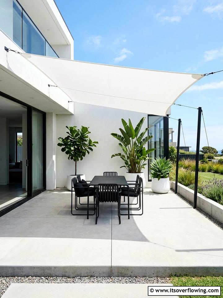 Minimalist White Shade Sail - 25 backyard ideas with shade sail