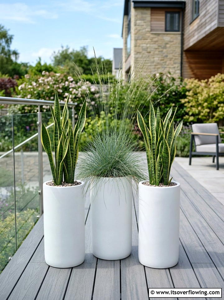 Modern Ceramic Planter Arrangement - 25 small garden ideas with container clusters