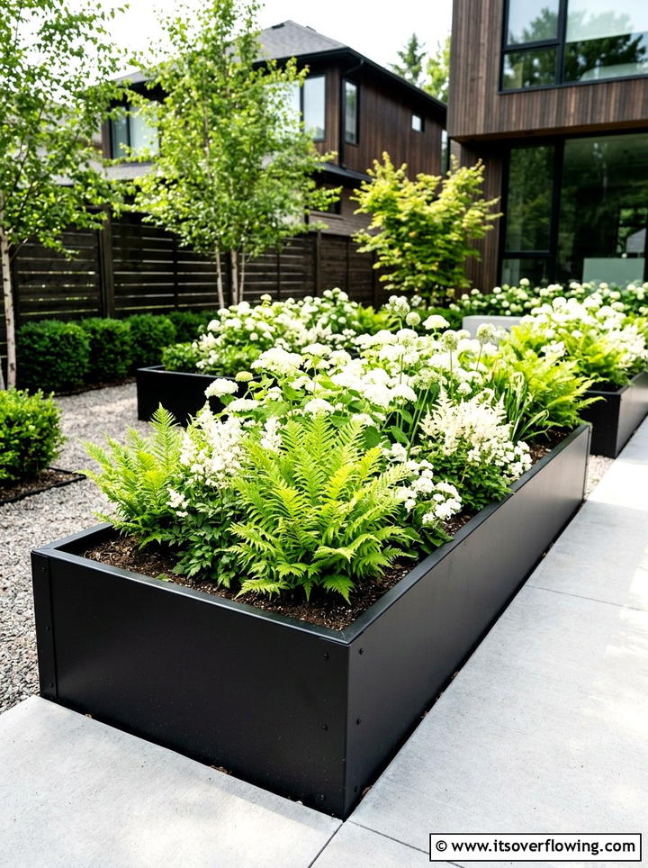 Modern black metal garden beds - 25 garden ideas with raised beds