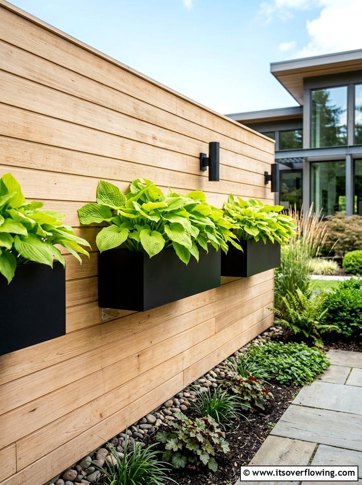 Modern black planters - 25 small garden ideas with wall planters
