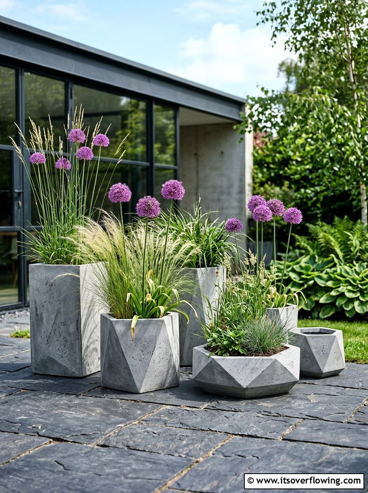 Modern geometric concrete planters - 25 garden decor ideas with floral displays