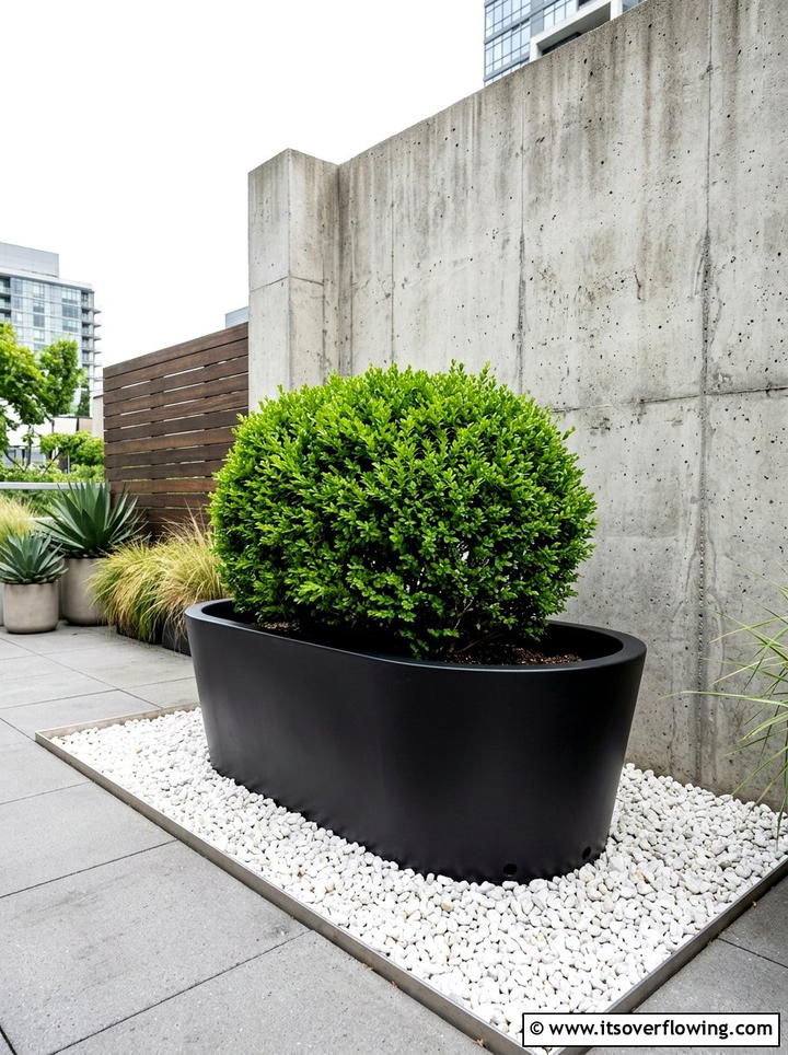 Modern minimalist bathtub planter - 25 upcycled garden ideas with old bathtubs
