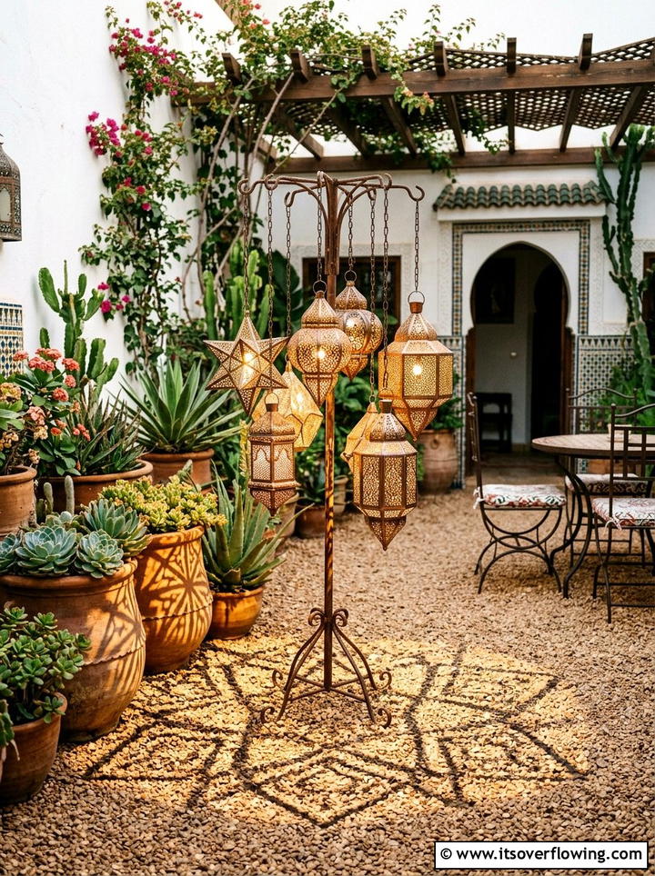 Moroccan metal lanterns on gravel - 25 garden decor ideas with lanterns