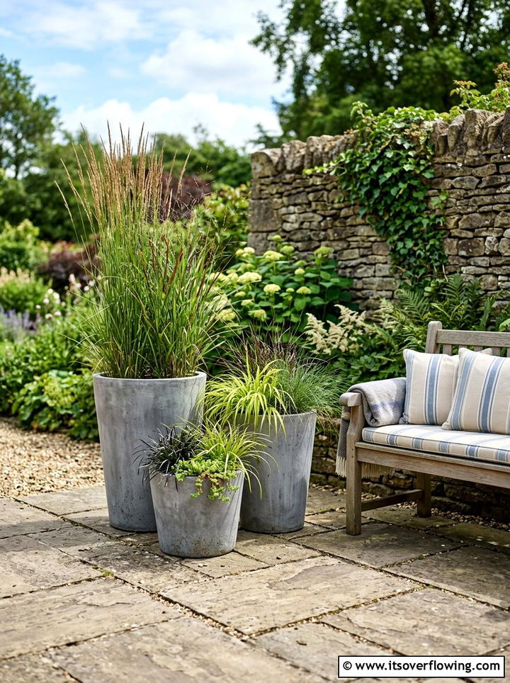 Multi level containers - 25 front porch ideas with tall planters