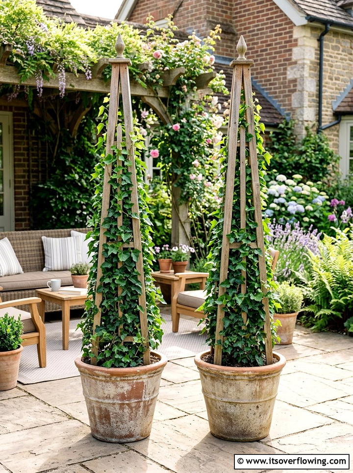 Obelisk Planter - 25 garden design ideas with height variation