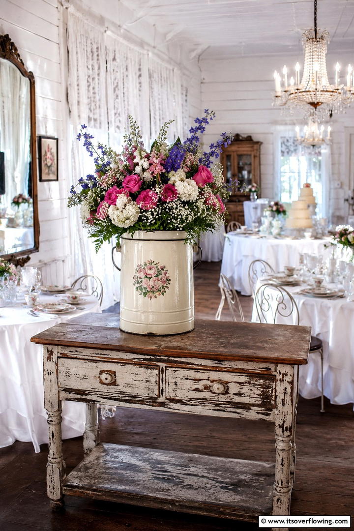 Old Fashioned Pail Filled with Blossoms - 30 Rustic Wedding Centerpieces for a Charming Celebration