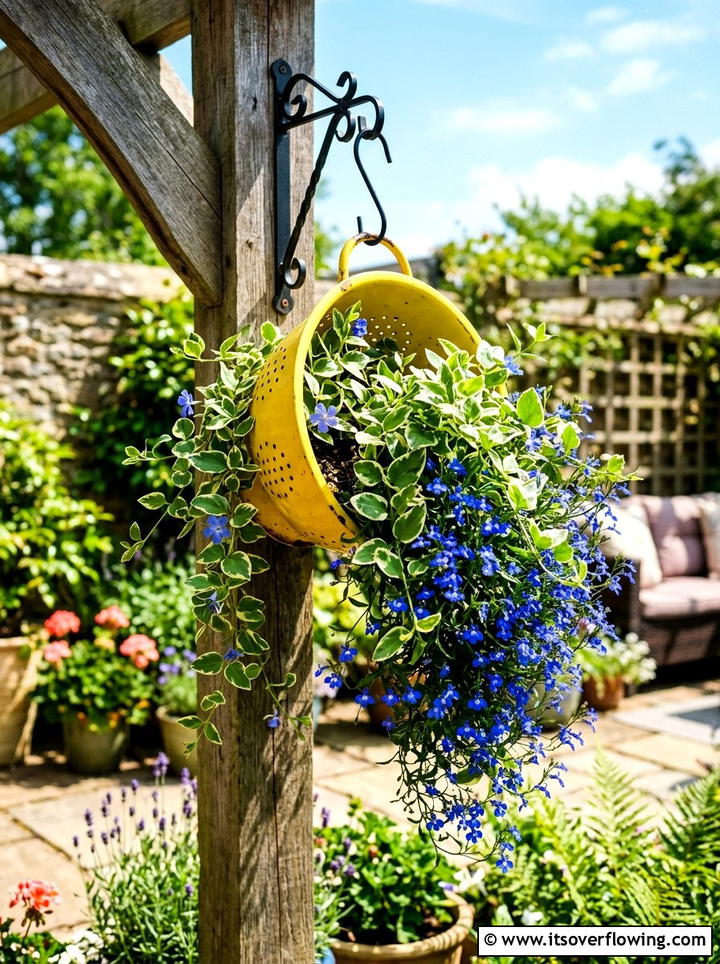 Old Metal Colander Planter - 25 upcycled garden ideas with cottage style