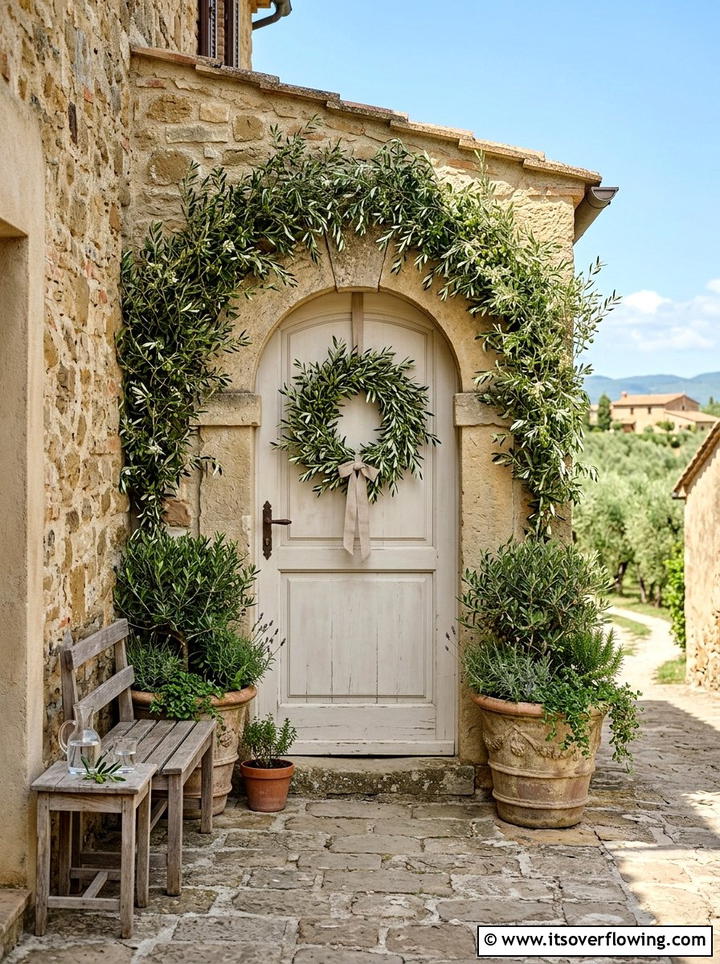 Olive Branch Entrance - 25 front porch ideas with seasonal wreaths