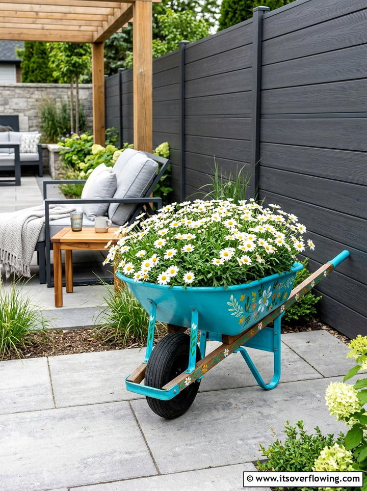 Painted Bright Wheelbarrow - 25 backyard ideas with wheelbarrow planter
